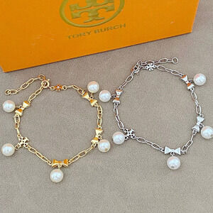 Tory Burch Silver Bow Pendant Chain Bracelet